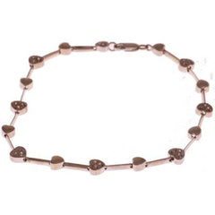 Dainty 14K White Gold Bracelet. The Bracelet Is Alternating Diamond And White Gold Heart Shaped Links. The Bracelet Contains Approximately .01Ct X 24 Round Diamonds. The Bracelet Measures 7.5 Inch. This Daz