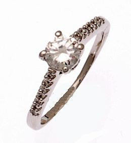Beautiful Engagement Style Ring With Cubic Zirconia'S. Rhodium Plated To Prevent Tarnishing. This Ring Will Enhance Any Occasion And Is Perfect For Every Bride.