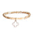 Trendy  Simulated Pearl Beaded Style Bracelet. The Bracelet Contains A Sterling Silver Clover Shaped Cut Out Cz Charm Hanging. This Bracelet Can Be Worn With Fashion Various Colors And Charms From This Collect