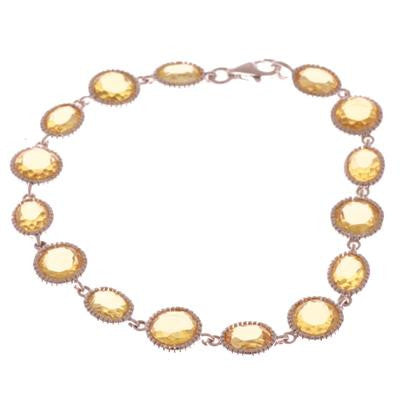Dainty Sterling Silver With Rhodium Overlay Circle And Oval Shaped Yellow Stone 7 Inch Bracelet.