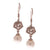 Dainty Sterling Silver With Rhodium Overlay Hanging Earrings With A  Simulated Pearl And An Octagon Swirl Shape Design With Cz Stones. The Simulated Pearl Measures To Approximately 7.7 Mm Wide. These Earrings Close W