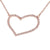 Dainty Sterling Silver With Rose Gold Overlay Heart Shaped Cut Out Design Necklace With Clear Cubic Zirconium Stones Around. The Necklace Measures 16 Inches And Has A One Inch Extender.
