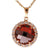 Dazzling Sterling Silver With Yellow Gold Overlay Round Orange Stone Pendant With Clear Cubic Zirconium Stones Around. Matching Earrings Available.