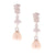 Dazzling Sterling Silver With Rhodium Overlay Dangling Earrings. The Earrings Contain A Double Row Of Four Round Clear Cubic Zirconium Stones And 1 Round Clear Cubic Zirconium Stone Dangling In Center And 7-7