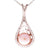 Dazzling Sterling Silver With Rhodium Overlay Teardrop Like Shaped Pendant With 9.5-10Mm Button Shaped Pink Simulated Pearl In Center And Clear Cubic Zirconium Stones Around. Matching Earrings Available.