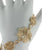 Dainty Italian Sterling Silver With Yellow Gold Overlay Flower Shaped Linked With Weave Design 8 Inch Bracelet With Approximately 1 Inch Extender.