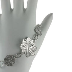 Dainty Italian Sterling Silver With Rhodium Overlay Flower Shaped Linked Weave Design 8 Inch Bracelet With Approximately 1 Inch Extender.