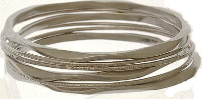 Beautiful Brass With A Gold Overlay Matte Hammered Bangles.