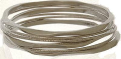 Beautiful Brass With A Gold Overlay Matte Hammered Bangles.