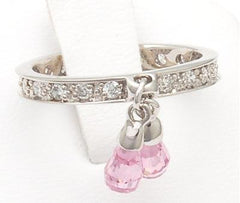 Adorable Sterling Silver With Cubic Zirconium Ring. Thin Cubic Zirconium Band With Two Hanging Pink Stones. Rhodium Plated To Prevent Tarnishing.