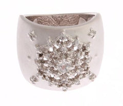 One Lady'S Thick Cigar Band Style Sterling Silver Ring With A Rhodium Overlay. The Ring Contains 1 Center Clear Round-Cut Cubic Zirconium Stone That Has A Weight Of Approximately 0.023 Ct. The Ring Also Has