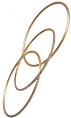 Stylish Sterling Silver With 14K Gold Overlay Tri-Bangle Bracelet Set. This Beautiful Set Of Bangles Include Two Brushed Round Bangles And One With C.Z.S.