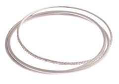 One Lady'S Sterling Silver With Brushed Rhodium Overlay Triple Bangle Bracelet Set. The Set Of Three Bangles Includes Two Brushed Circular Bangle Style Bracelets, And One With Sparkling Cubic Zirconias. Pro