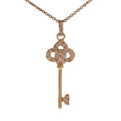 Designer Inspired Dainty Sterling Silver With 14K Yellow Gold Overlay Key Pendant. The Pendant Contains A Clover Shaped Top Part With .002Ct X 15 Round Clear Cubic Zirconium Stones Around And .002Ct X 7 Round