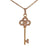 Designer Inspired Dainty Sterling Silver With 14K Yellow Gold Overlay Key Pendant. The Pendant Contains A Clover Shaped Top Part With .002Ct X 15 Round Clear Cubic Zirconium Stones Around And .002Ct X 7 Round