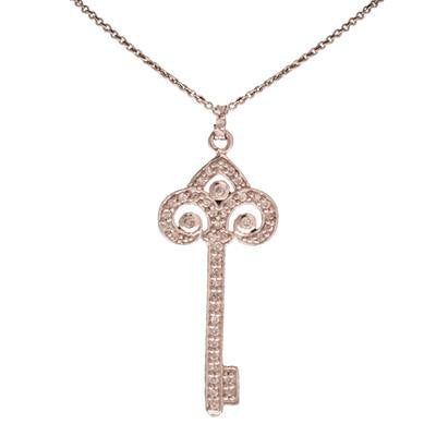 Dainty Designer Inspired Sterling Silver With Rhodium Overlay Key Pendant. The Pendant Contains .01Ct X 42 Round Clear Cubic Zirconium Stones. This Elegant Pendant Is Sure To Add Flair To Your Wardrobe. This