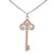 Dainty Designer Inspired Sterling Silver With Rhodium Overlay Key Pendant. The Pendant Contains .01Ct X 42 Round Clear Cubic Zirconium Stones. This Elegant Pendant Is Sure To Add Flair To Your Wardrobe. This