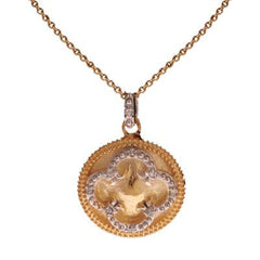 Trendy Two Tone Sterling Silver With 14K Yellow Gold Overlay And Rhodium Overlay Pendant Style Necklace. The Necklace Contains A Round Circle Design Disc With A Clover In Center And Circle Design On It With
