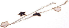 Designer Inspired Sterling Silver With A 14K Gold Overlay Bracelet. Cream Clover, And Heart, Black Star And Butterfly Enamel Charms Throughout Bracelet.