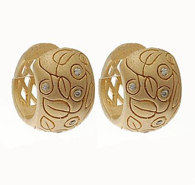 Beautiful Sterling Silver With A 14K Gold Overlay Huggy Style Earrings. Stylish Leaf Design Throughout Earring.