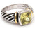 Designer Inspired Beautiful Cocktail Ring. Citrine Color Channel Set Center Stone With Elegant Filigree Design On The Sides. Ring Is Rhodium Plated To Prevent Tarnishing.