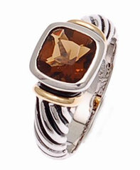 Designer Inspired Beautiful Cocktail Ring. Brown Smokey Topaz Channel Set Center Stone With Elegant Filigree Design On The Sides. Ring Is Rhodium Plated To Prevent Tarnishing.