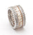 Stunning Sterling Silver Eternity Band Style Ring. This Ring Is Perfect For A Bride And Is Fit For Every Occasion. Princess Cut Champagne Cubic Zirconias Set In A Channel Setting Surround Entire Ring. Ring