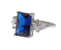 Stunning Sterling Silver Blue Sapphire Color Emerald Stone Cocktail Ring. Ring Is Rhodium Plated To Prevent Tarnishing.