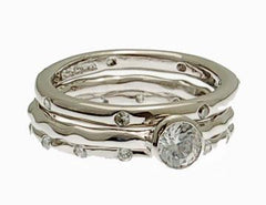 Designer Inspired Elegant Sterling Silver Hammered Triple Stacking Ring. Center Cubic Zirconium Stone. This Ring Adds Flair And Sparkle To Any Ensemble. Rhodium Plated To Prevent Tarnishing.