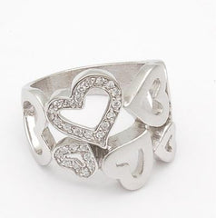Designer Inspired Sterling Silver With Cubic Zirconium Heart Ring. Various Shaped Hearts Throughout Ring. Ring Is Rhodium Plated To Prevent Tarnishing.
