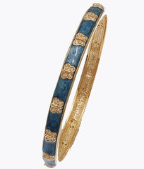 Add Flair To Your Wardrobe With This Designer Inspired Brass Blue Enamel Metallic Bangle. This Bangle Could Be Worn Alone Or Combined With Fashion Colors. Matching Ring Available.